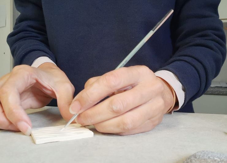 Each tile is hand painted